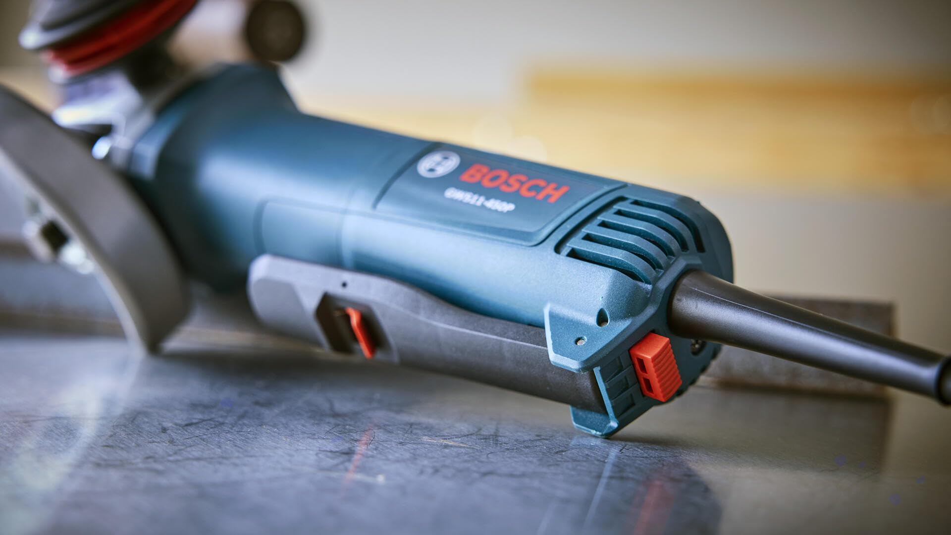 11 Amp 4 Inch Ergonomic Angle Grinder with Kickback Control